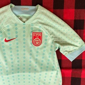 Nike Boy’s DRI-FIT China Soccer Jersey size medium sea foam, light blue and red